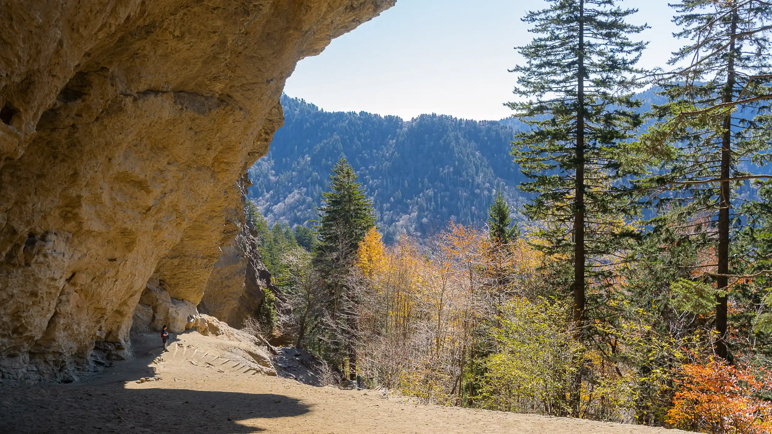Hiking Alum Cave Trail with view of Alum Cave Bluffs and Smoky Mountain ridges