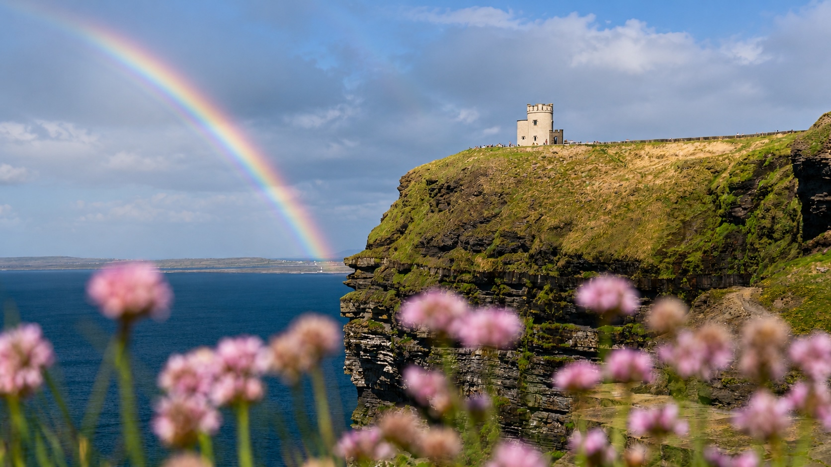 Rainbow over the Cliffs of Moher and O’Brien’s Tower in Ireland